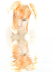 Image showing lovely redhead in water