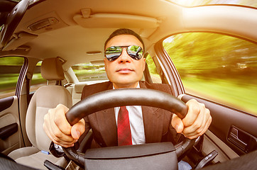 Image showing Man driving a car.