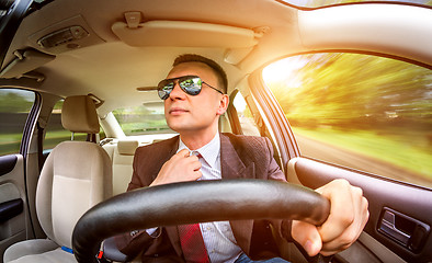 Image showing Man driving a car.