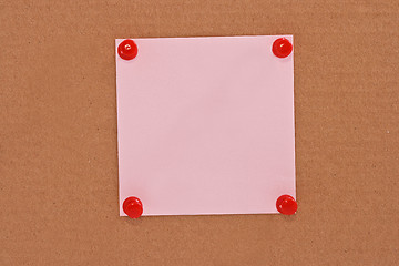 Image showing Pink note paper attached with red pins