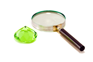 Image showing Green diamond crystall with magnifier