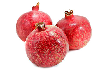 Image showing Ripe pomegranates isolated on white background