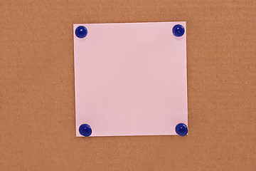Image showing Pink note paper attached with blue pins