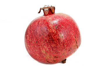 Image showing Ripe pomegranate isolated on white background