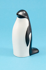 Image showing toy penguin figurine home decor on blue background 