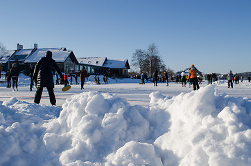 Image showing pile snow people skate play eisstock active 