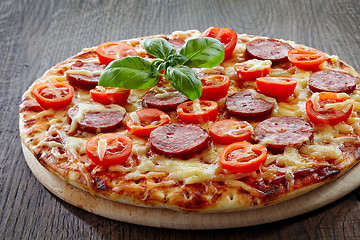 Image showing Salami and tomato pizza