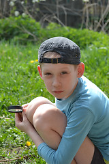 Image showing the teenager with a magnifying glass