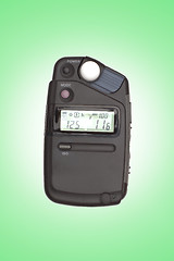 Image showing Digital flashmeter, isolated on green backrgound