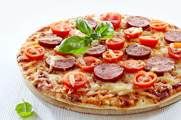 Image showing Salami and tomato pizza