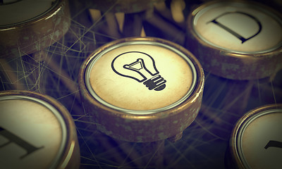 Image showing Lamp Bulb Typewriter Key. Grunge Background.