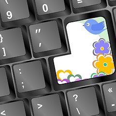 Image showing bird and flowers on computer keyboard key