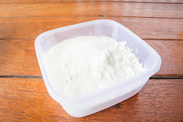 Image showing Bakery mix flour measured in plastic box 