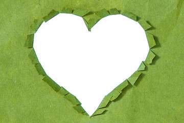 Image showing Ripped  heart in a green paper