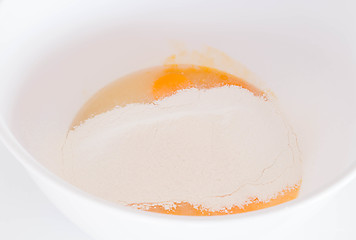 Image showing Home made bakery flour mixing with egg
