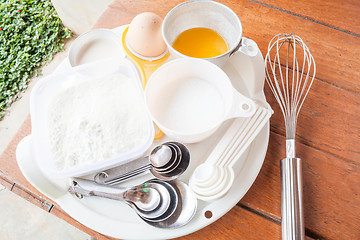 Image showing Set of baking ingredients with measure spoon 