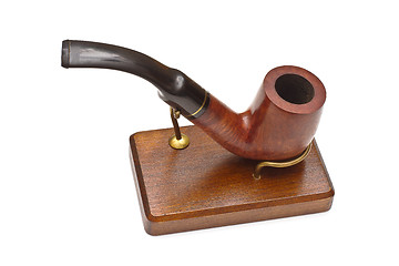 Image showing Smoking pipe on stand, isolated