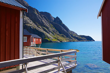 Image showing Fishing huts in fjord