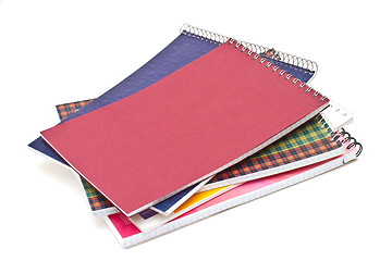 Image showing Several notebooks, isolated on white background