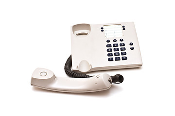 Image showing Grey plastic telephone on white background