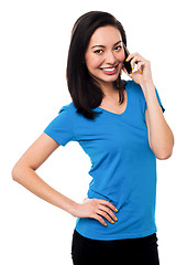 Image showing Young girl speaking over cellphone