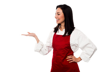 Image showing Female chef promoting bakery product