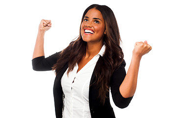 Image showing Excited businesswoman with clenched fists