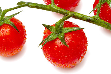 Image showing Ripe cherry tomatoes on white background