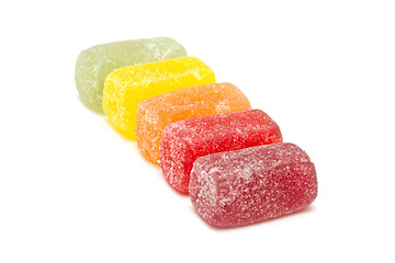 Image showing Different fruit jellies on white background