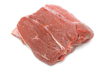 Image showing Piece of raw beef on white