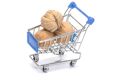 Image showing Walnuts in shopping cart on white