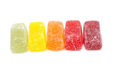 Image showing Different fruit jellies on white background