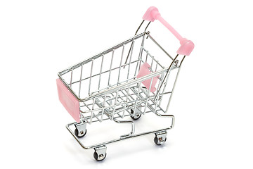 Image showing Pink shopping cart on white