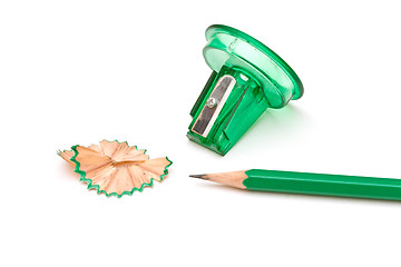 Image showing Green sharpener and pencil on white background.