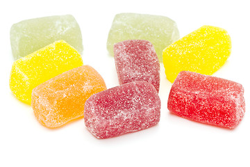 Image showing Different fruit jellies on white background