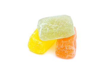 Image showing Different fruit jellies on white background