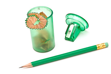 Image showing Green sharpener and pencil on white background.