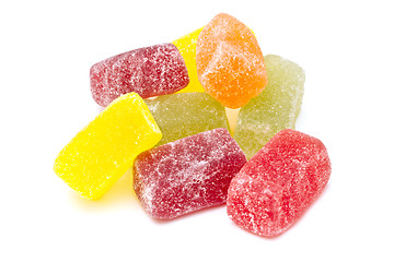 Image showing Different fruit jellies on white background