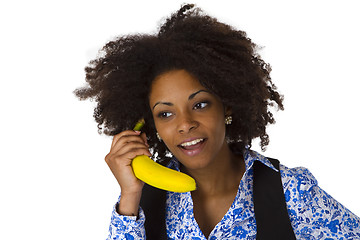 Image showing Female afro american with banana