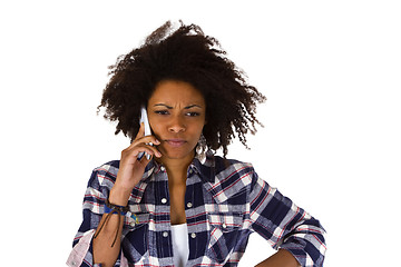 Image showing Angry african american woman with cellphone