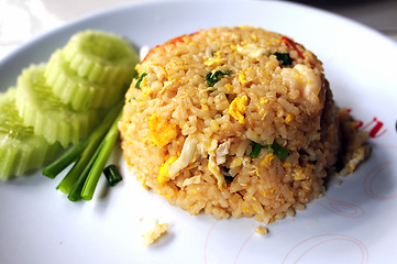 Image showing Rice with fried egg and cucumber