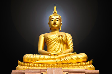 Image showing Gold buddha statue on black background