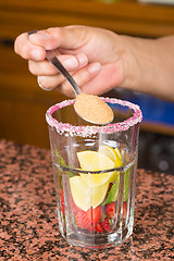 Image showing Preparing a strawberry mojito