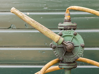 Image showing Old handle with a crane