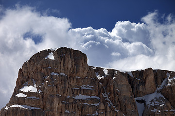 Image showing Top of mountain and blue sky with clouds