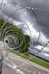 Image showing barbed wire,