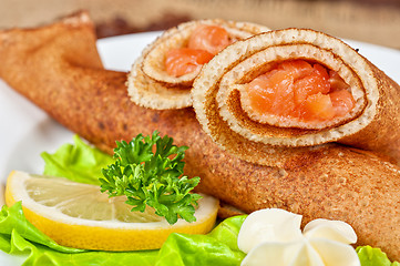 Image showing Pancakes with salmon