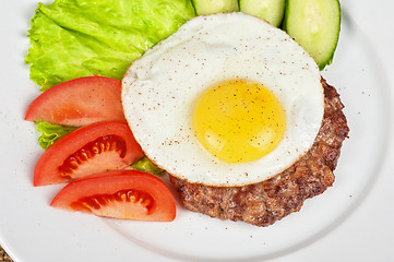 Image showing steak beef meat with fried egg