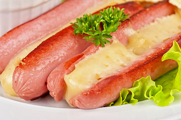 Image showing sausages with cheese and omelette