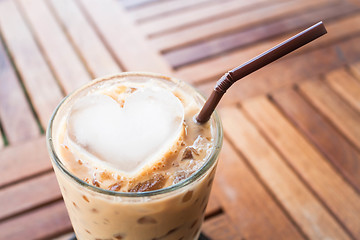 Image showing Cold coffee drink with heart ice cube  